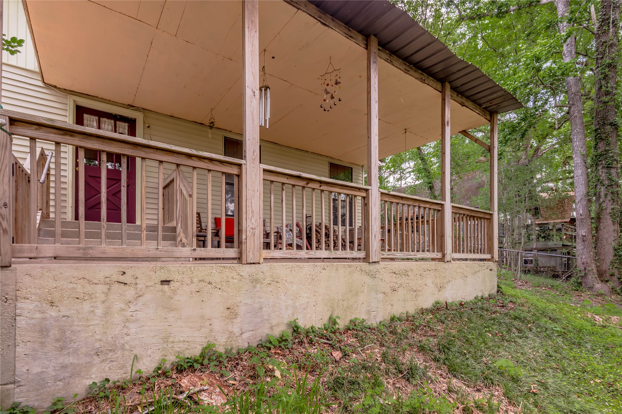 109 Hill Top Road Huntsville, TX 77320 - Photo 20 of 38 front view of a house with a small yard