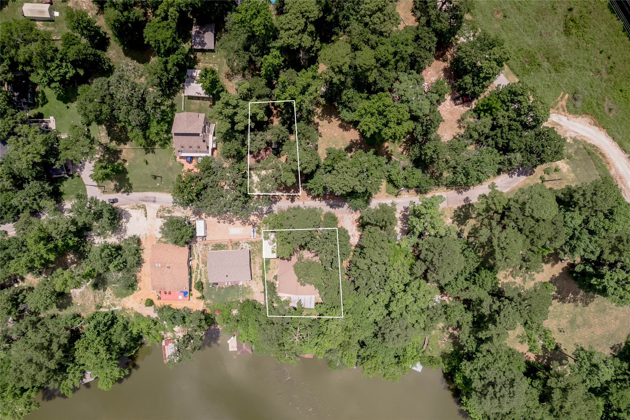 109 Hill Top Road Huntsville, TX 77320 - Photo 22 of 38 an aerial view of multiple house