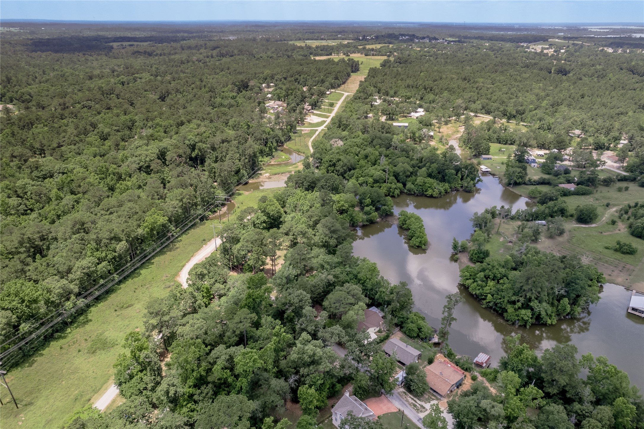 109 Hill Top Road Huntsville, TX 77320 - Photo 28 of 38 an aerial view of residential house with outdoor space and trees all around