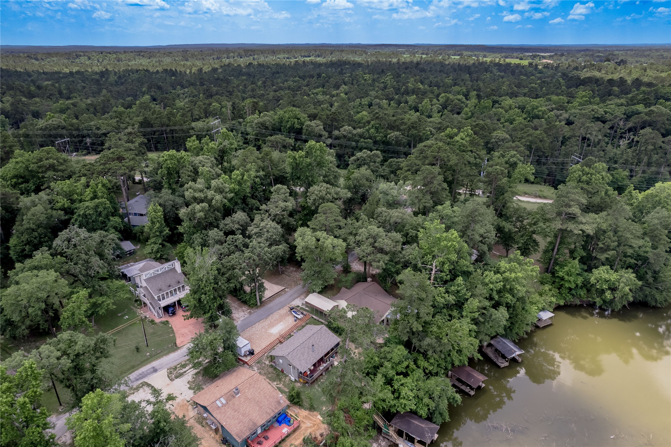 109 Hill Top Road Huntsville, TX 77320 - Photo 30 of 38 an aerial view of a house with a yard