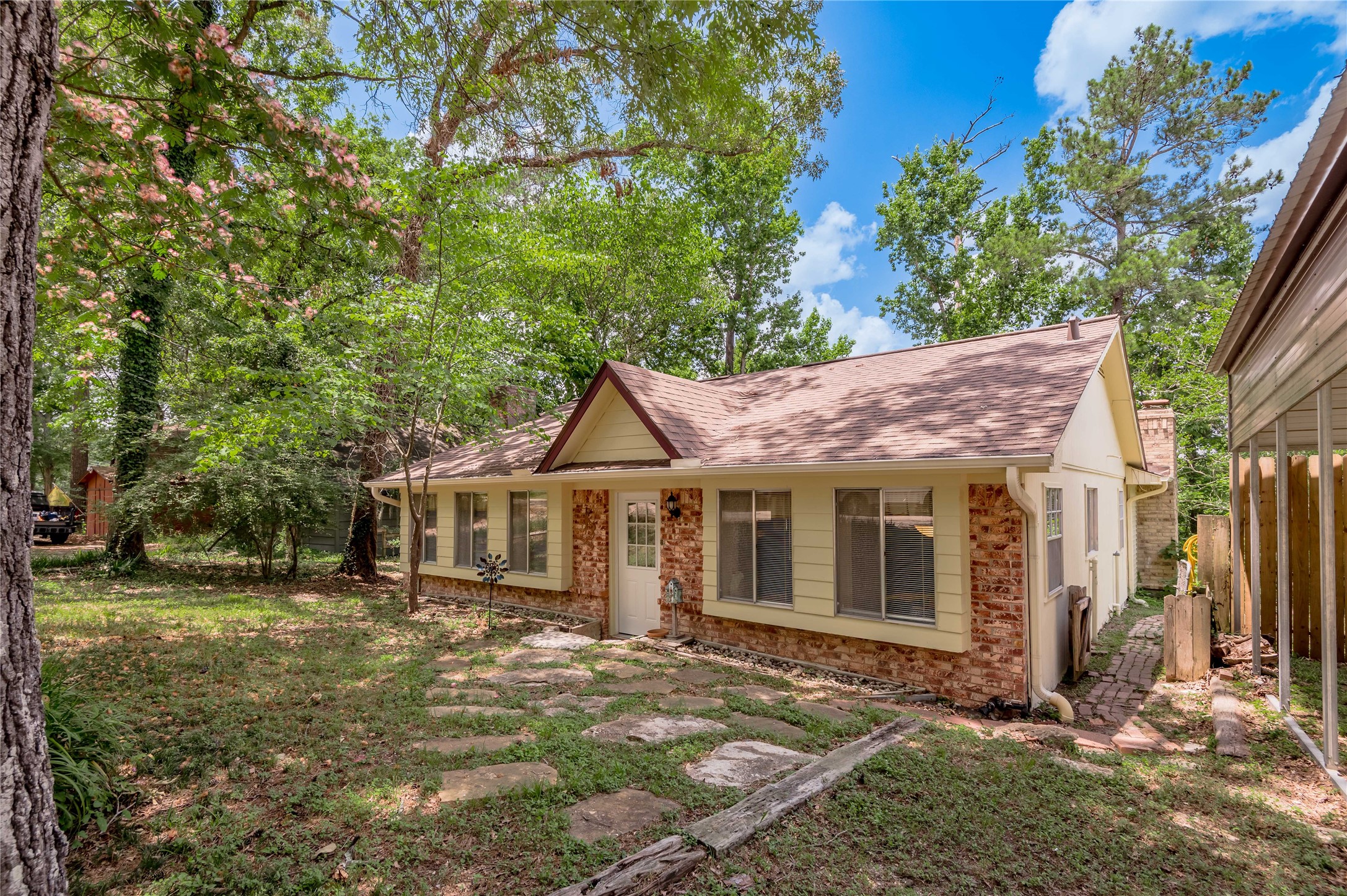 109 Hill Top Road Huntsville, TX 77320 - Photo 6 of 38 a view of a house with a yard