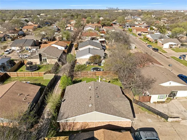 an aerial view of residential house with outdoor space