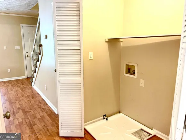 a bathroom with a sink and a shower