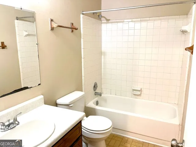 a bathroom with a sink and a toilet