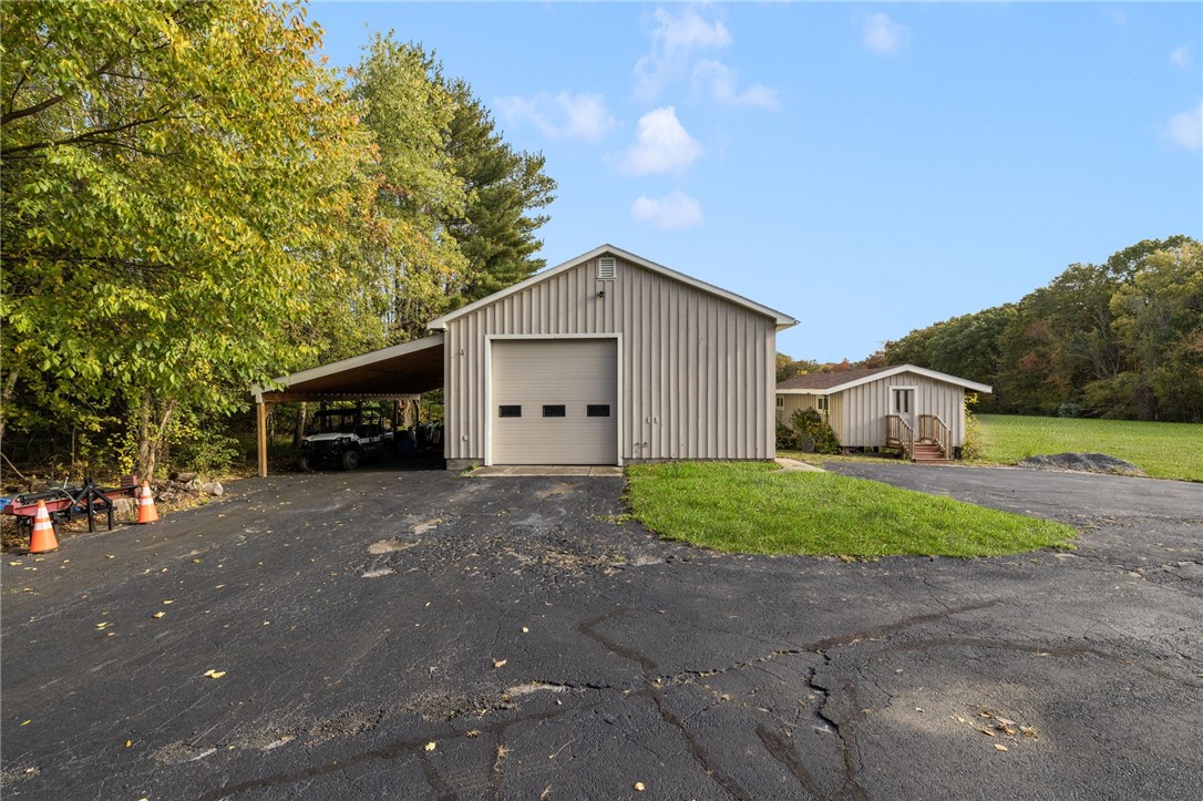 365 West Wrentham Road Cumberland, RI 02864 - Photo 43 of 50 Oversized additional garage with lean-to. To the right is the storage shed