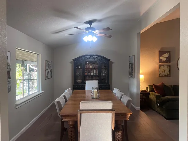 a view of a livingroom with furniture and a chandelier