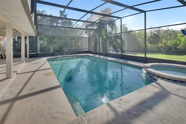 a swimming pool with a yard