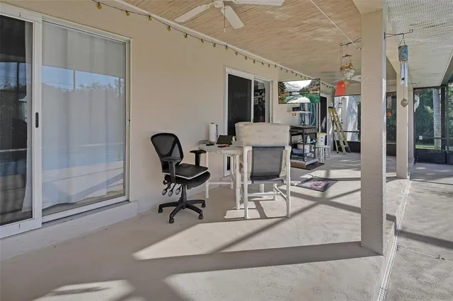 a view of a livingroom with furniture and window