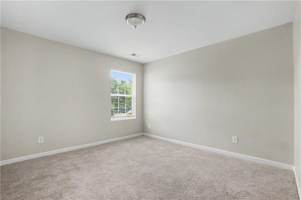 375 Walton View Fairburn, GA 30213 - Photo 21 of 38 a view of room and window