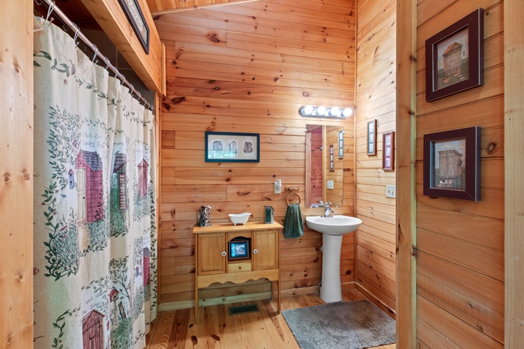 66 Fortenberry Road Young Harris, GA 30582 - Photo 17 of 55 a bathroom with a sink toilet and shower