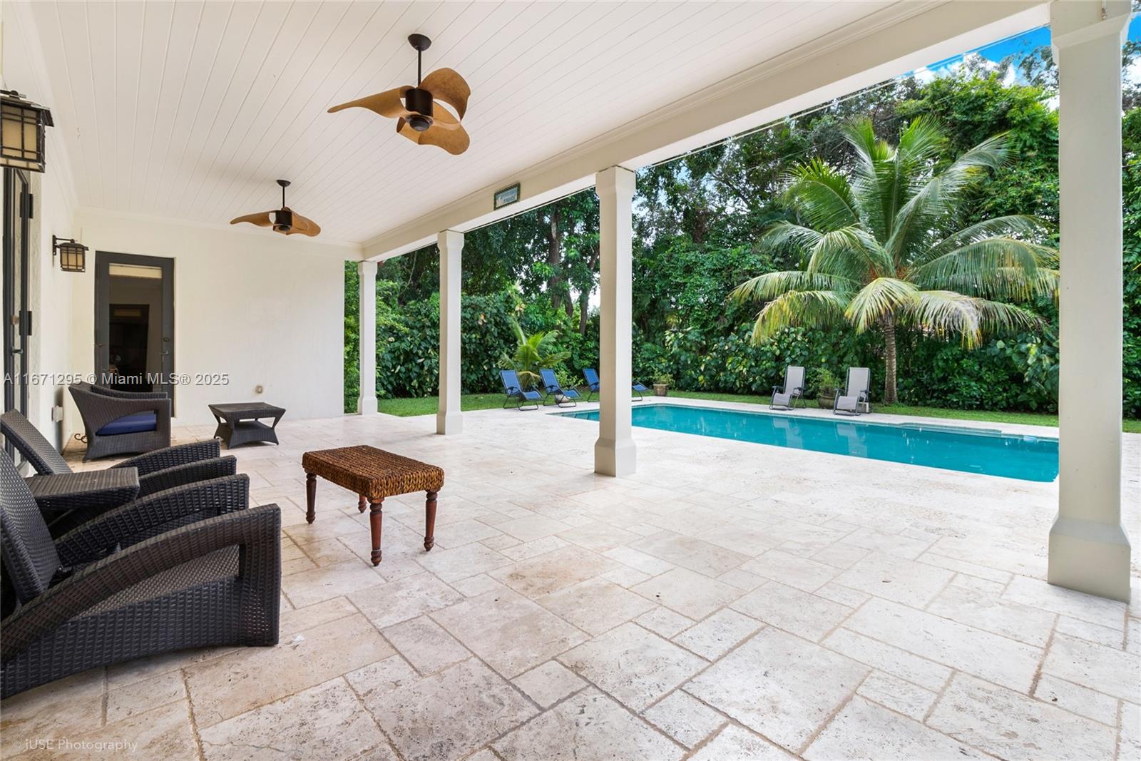 8240 Southwest 98th Street Miami, FL 33156 - Photo 15 of 17 a view of a patio with a yard