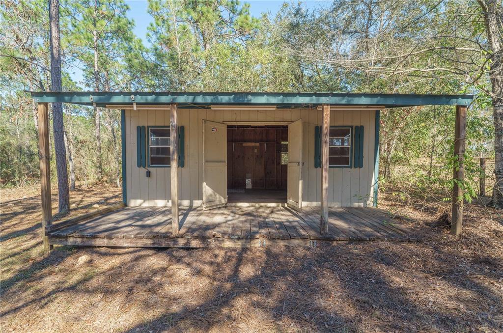 16621 Southwest 45th Street Ocala, FL 34481 - Photo 48 of 52 front view of a house with a large window