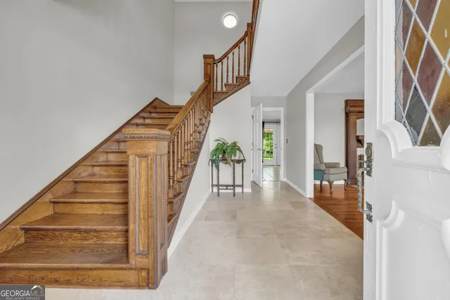 a bed room with a bed and a window