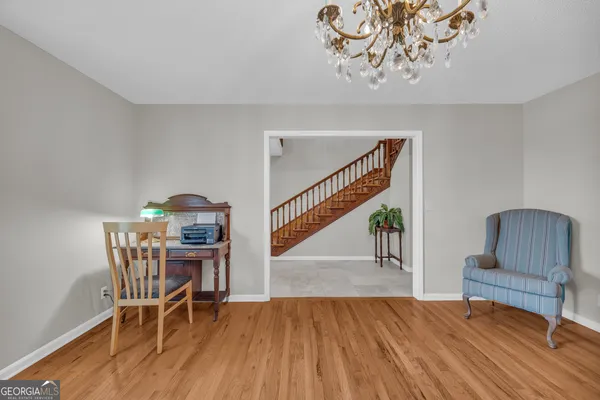 a spacious bedroom with a bed and a fireplace