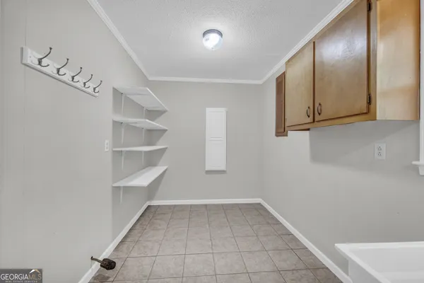 a big yard with large trees