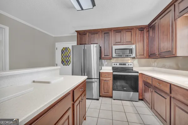 a view of a dining room with furniture wooden floor and chandelier