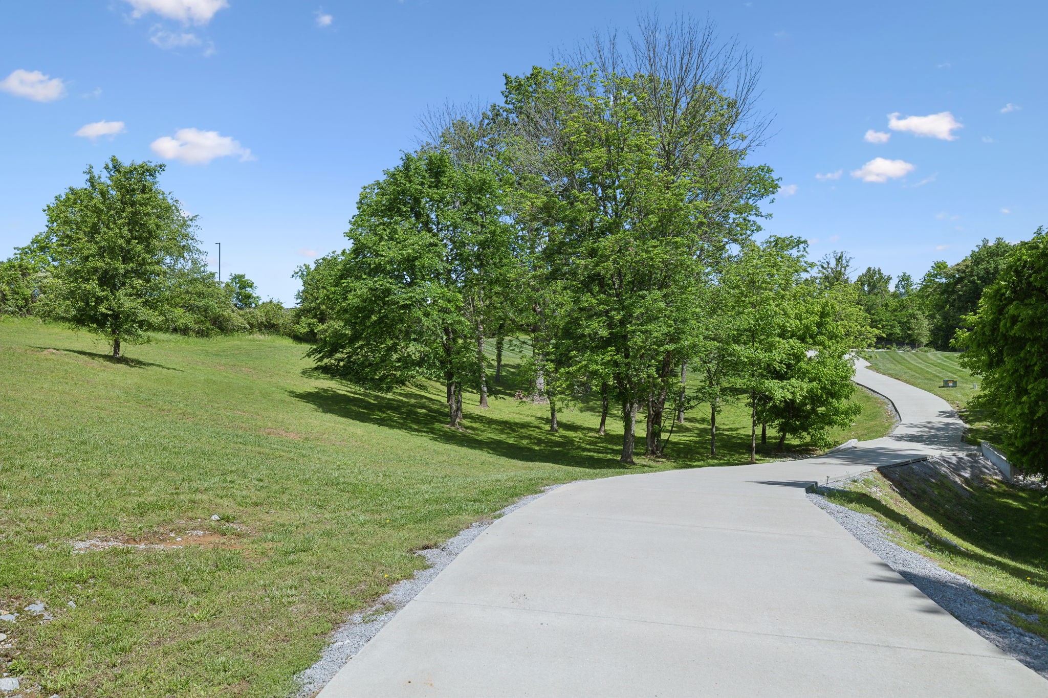 4160 Clovercroft Road Franklin, TN 37067 - Photo 13 of 62 a view of a garden with a building in the background