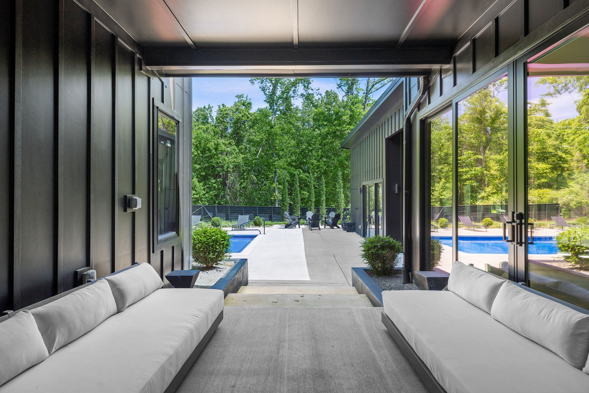 4160 Clovercroft Road Franklin, TN 37067 - Photo 21 of 62 a living room with patio furniture and a floor to ceiling window