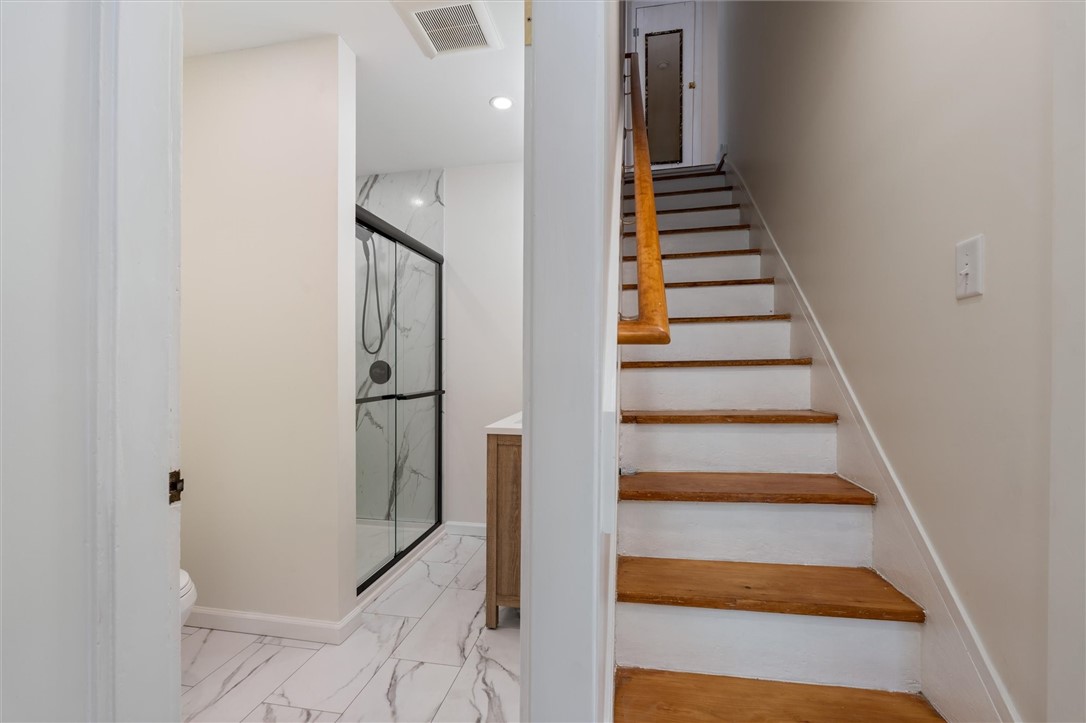 24 Fitch Avenue Auburn, NY 13021 - Photo 27 of 50 View of stairway and bathroom