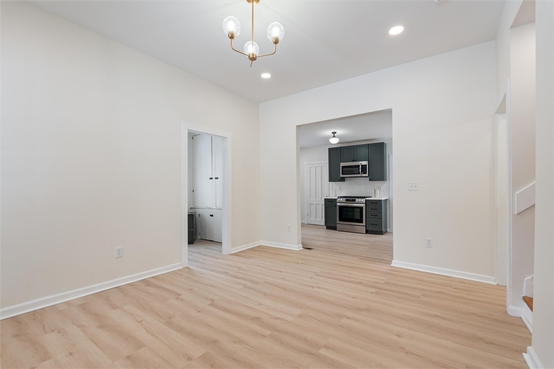 24 Fitch Avenue Auburn, NY 13021 - Photo 7 of 50 View of dining/kitchen/office from living room