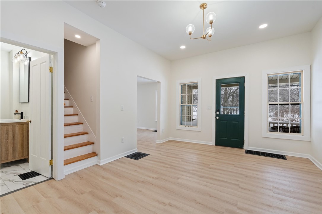 24 Fitch Avenue Auburn, NY 13021 - Photo 8 of 50 View of dining/bath/living/stairway from kitchen