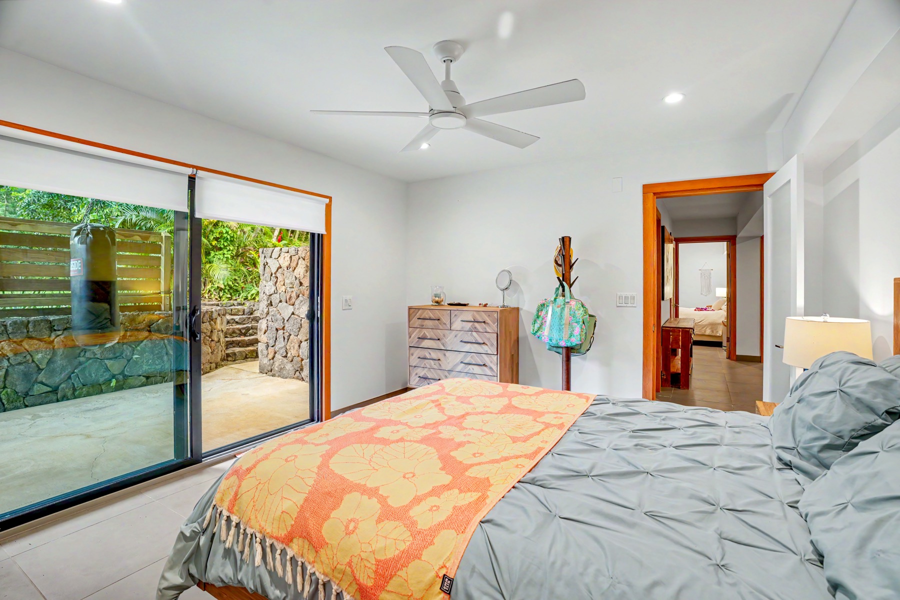 4470 A Wailapa Road Kilauea, HI 96754 - Photo 17 of 30 a bedroom with a large bed and a large window