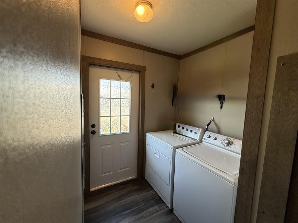 4937 Stuart Road Denton, TX 76207 - Photo 11 of 19 a utility room with dryer and washer
