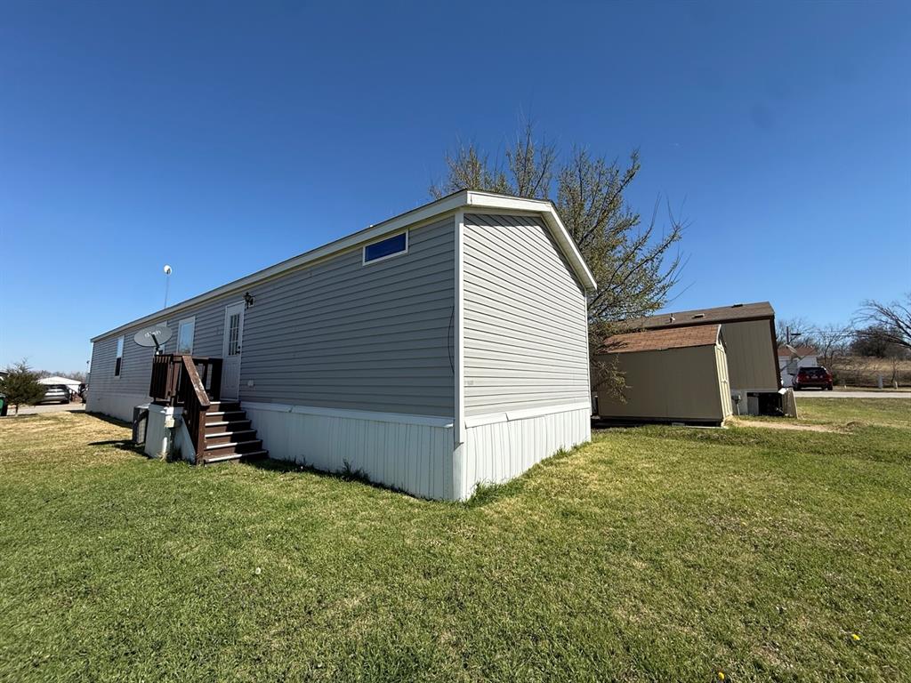 4937 Stuart Road Denton, TX 76207 - Photo 2 of 19 a view of a backyard