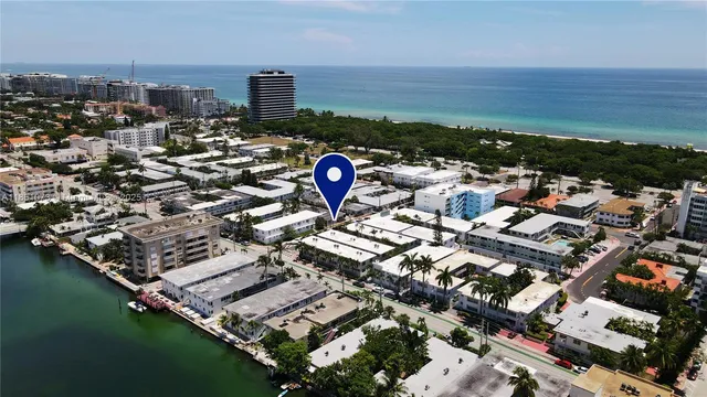 an aerial view of a city with lawn chairs