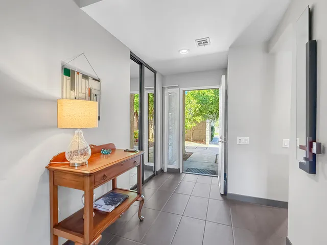 a room with a bed and a window