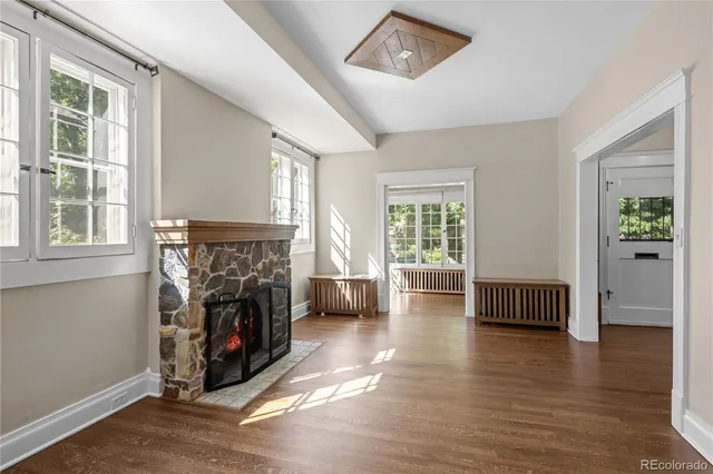 a view of livingroom with hardwood floor and a ceiling fan