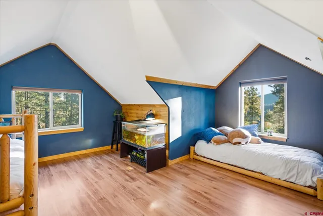 a balcony view with a rug