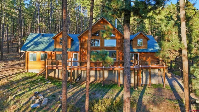 a view of a balcony with wooden floor