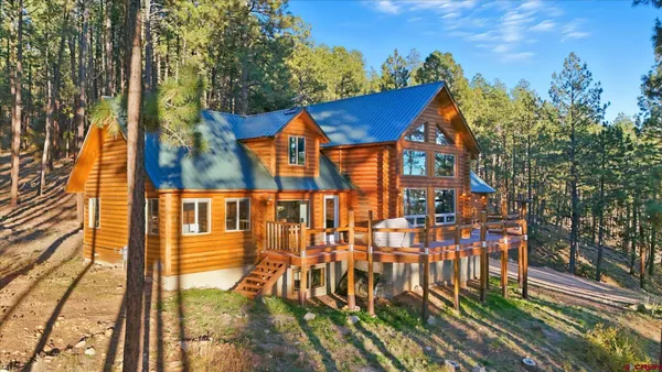 a view of a balcony with wooden floor