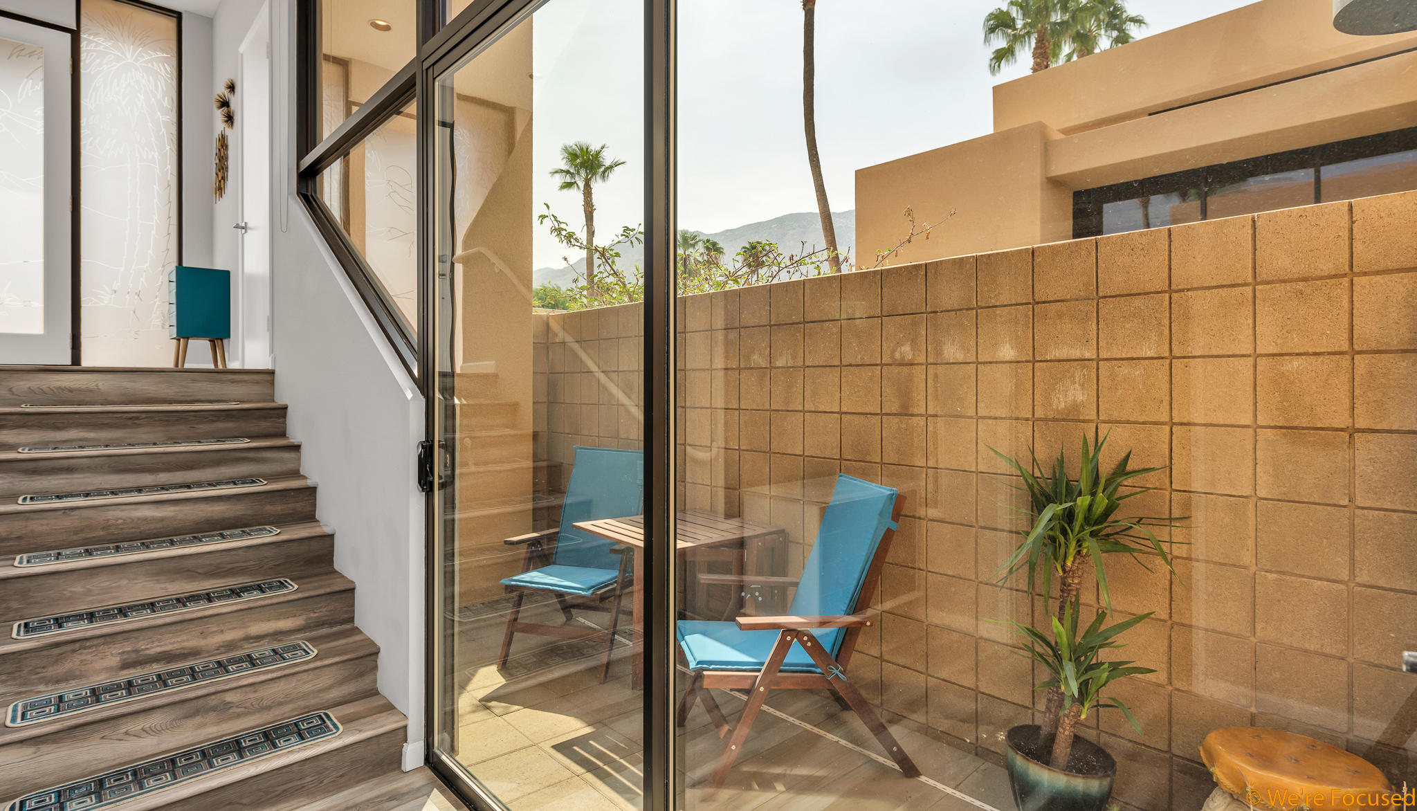 100 East Stevens Road, Unit 507 Palm Springs, CA 92262 - Photo 10 of 25 a view of a staircase with wooden floor and door