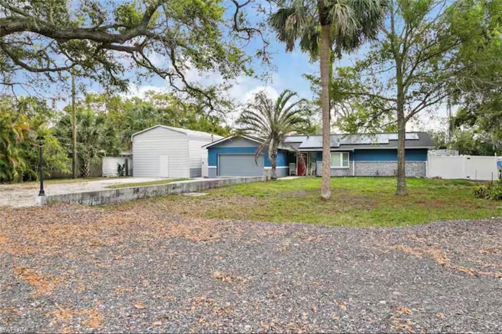 a house with trees in front of it
