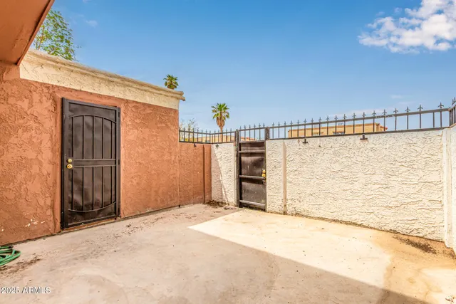 a view of outdoor space and front view of a house