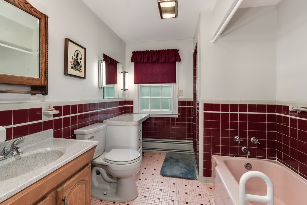 53 Kinnicutt Road Worcester, MA 01602 - Photo 18 of 30 a bathroom with a sink a toilet and shower