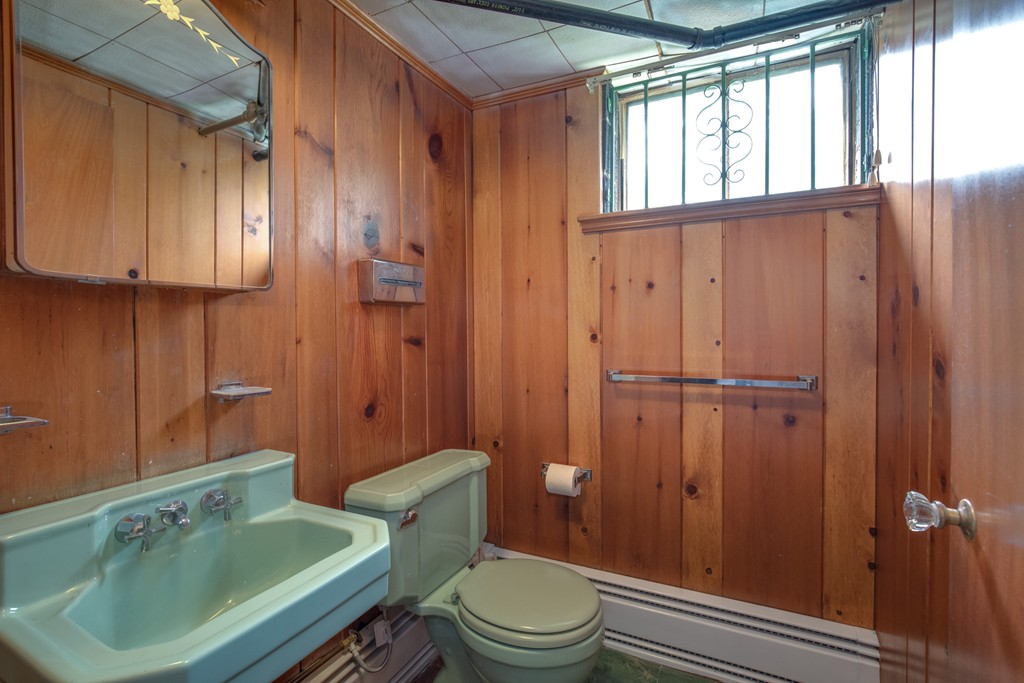 53 Kinnicutt Road Worcester, MA 01602 - Photo 25 of 30 a bathroom with a sink a toilet and tub