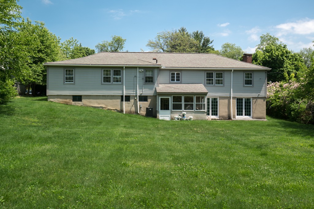 53 Kinnicutt Road Worcester, MA 01602 - Photo 27 of 30 a front view of a house with a yard