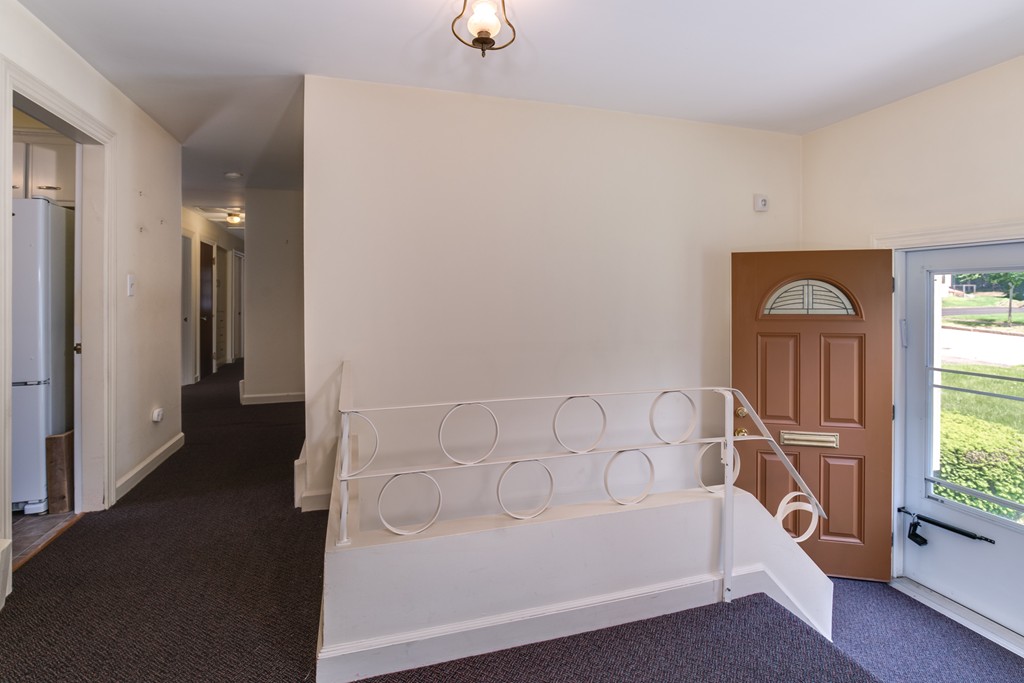 53 Kinnicutt Road Worcester, MA 01602 - Photo 4 of 30 a bathroom with a bathtub and a shower