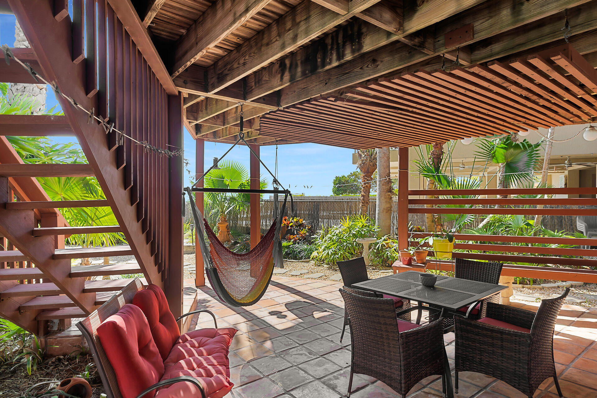 42 Treasure Road Marathon, FL 33050 - Photo 45 of 70 a patio with sofas table and chairs