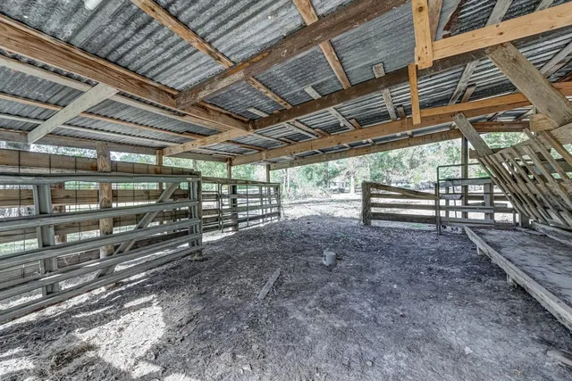 a view of a room with wooden roof