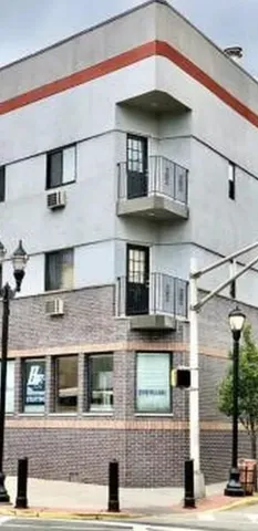 a front view of a building with street