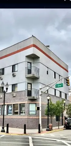 a view of a building and a street