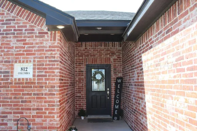 a front view of a house with a shower