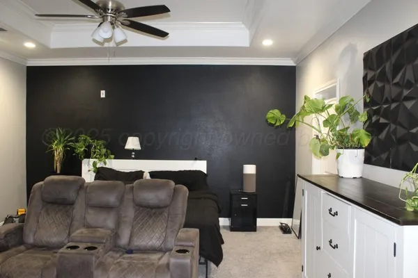 a dining room with furniture and potted plant