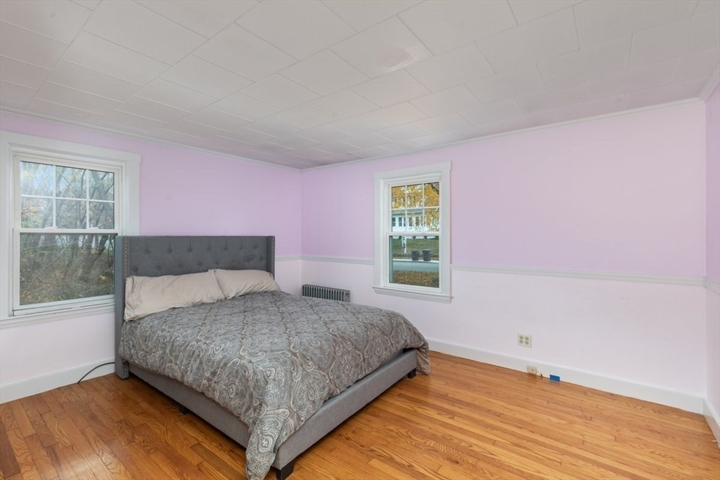 220 Pelham Street Methuen, MA 01844 - Photo 11 of 19 a bedroom with a bed and window