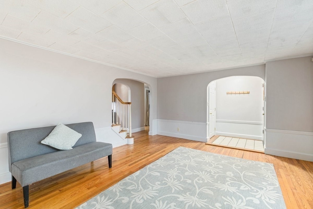 220 Pelham Street Methuen, MA 01844 - Photo 5 of 19 a bedroom with a bed and a dresser