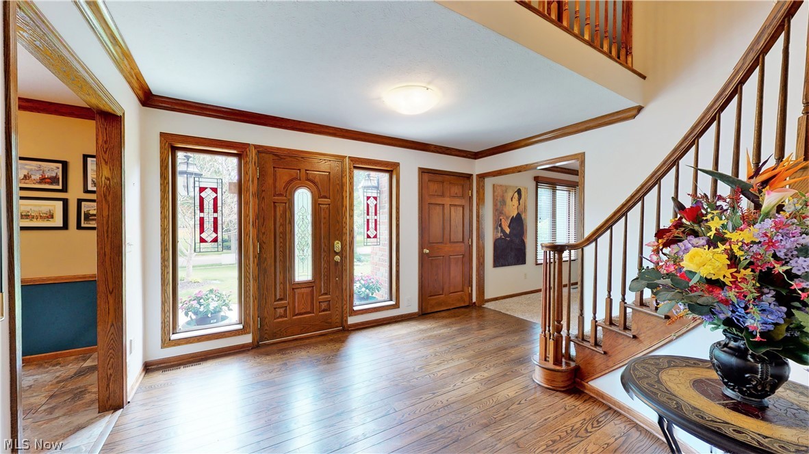 2549 Sourek Road Akron, OH 44333 - Photo 4 of 28 A grand entrance! Welcome to YOU and all of your guests. Looking to your left is the Dining Area and to the Right is the Living Area.